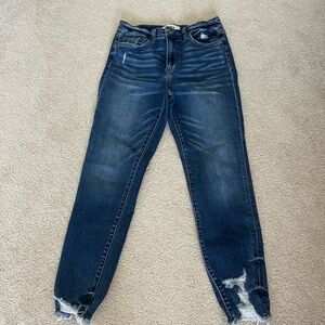 Blue Skinny Jeans with Distressed Hem and High-Rise Waist